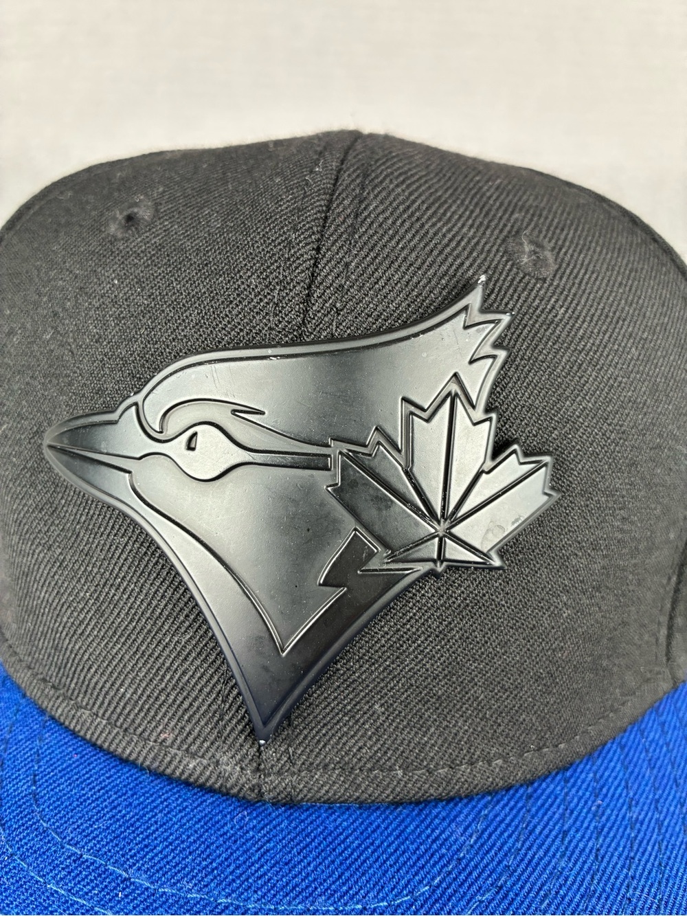 New Era 7 1/8 Metal Logo Black and Blue Toronto Blue Jays Hat